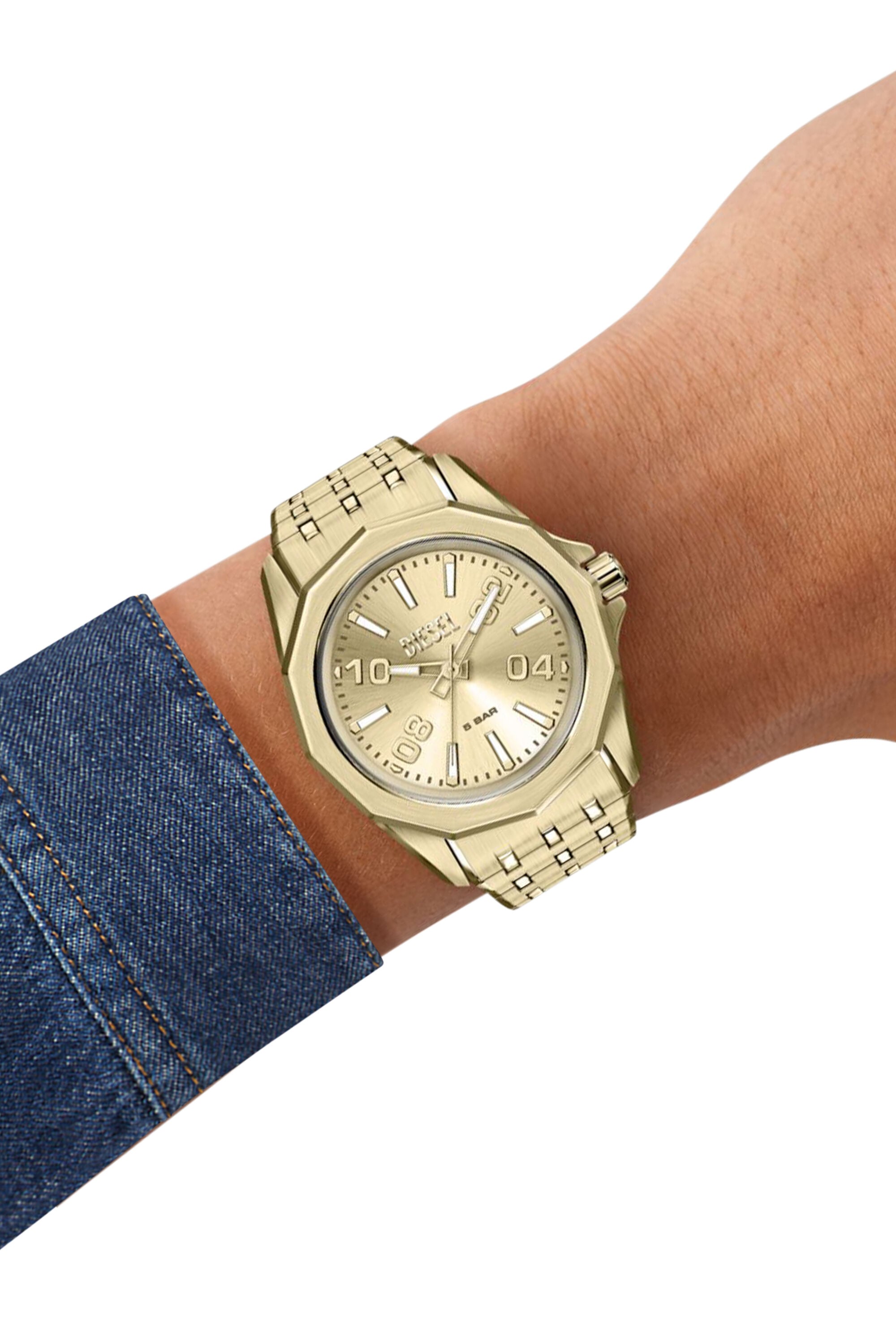 DZ2239 WATCH Stinger gold-tone stainless steel watch｜ゴールド