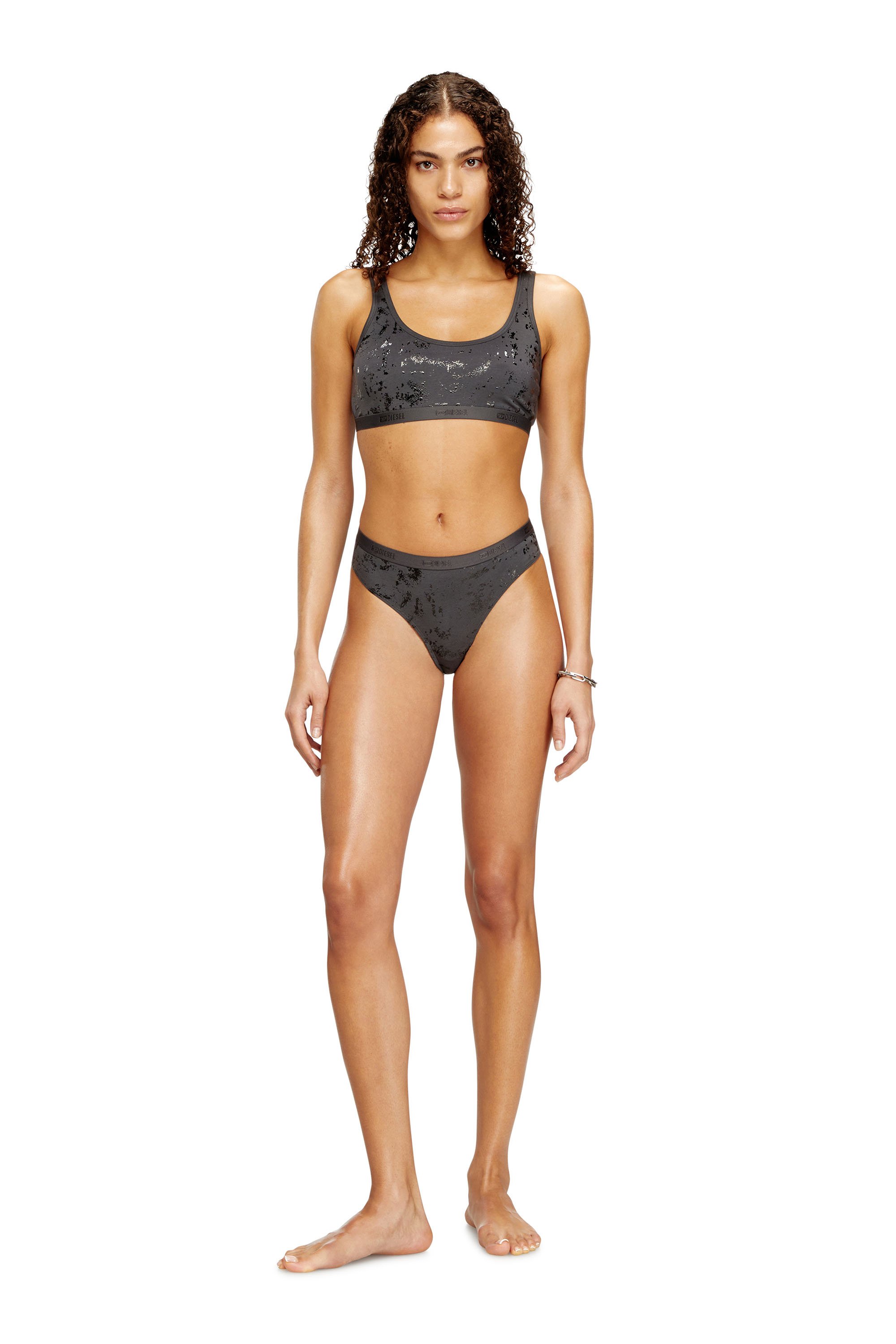 Diesel - STARS-GFT, Female's Damen-String aus Stretch-Baumwolle mit einem behandelten Metallic-Effekt, der im Licht schimmert. Abgerundet mit einem weichen, elastischen Bund, der rundum mit einem Diesel-Logo versehen ist. in null - 1