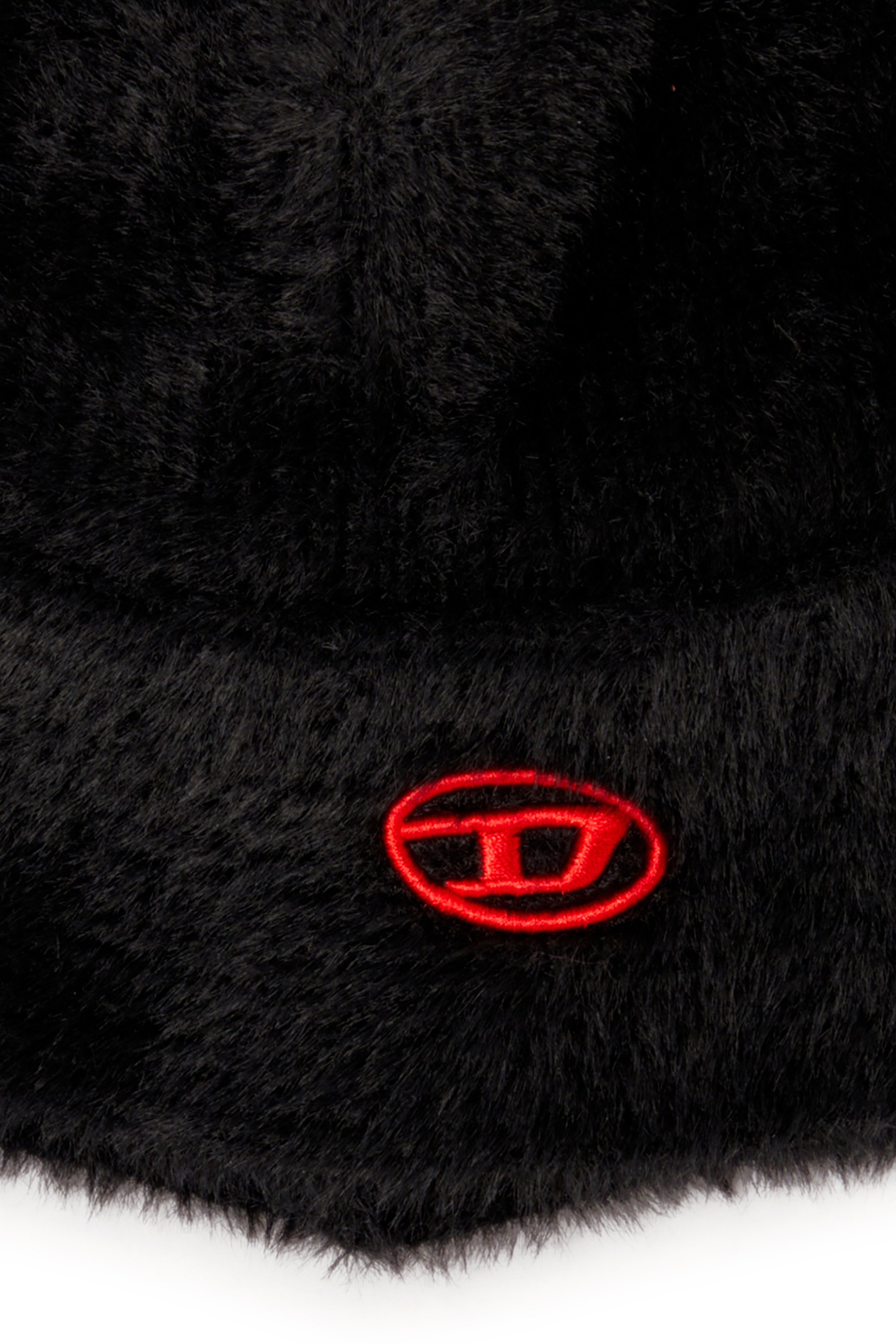 Diesel - K-SOLANGE, Unisex's Dieser Unisex-Bucket Hat ist aus weichem Nylongarn gefertigt, in einer plattierten Rippenstruktur gestrickt für einen flauschigen, texturierten Effekt. Das Design verfügt über eine lockere Krempe und ein aufgesticktes Oval-D-Logo in farblich passendem Garn. in ブラック - 3